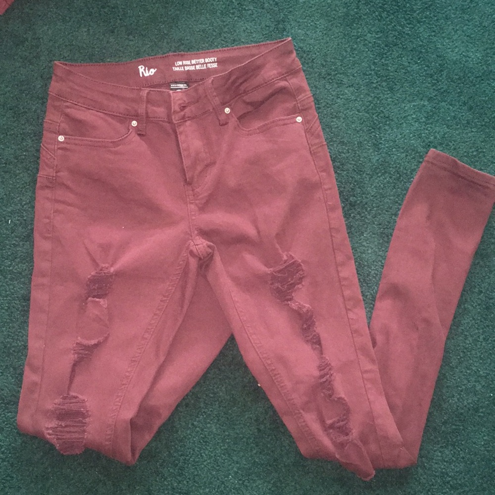 Burgundy ripped jeans